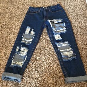 Medium wash distressed boyfriend jeans